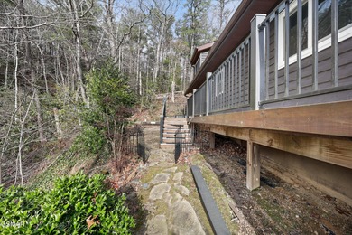 This 3-bedroom, 2-bath beauty sits on two very private lots on Bent Creek Golf Course in Tennessee - for sale on GolfHomes.com, golf home, golf lot