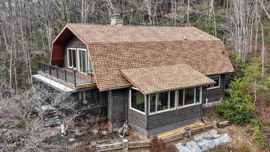This 3-bedroom, 2-bath beauty sits on two very private lots on Bent Creek Golf Course in Tennessee - for sale on GolfHomes.com, golf home, golf lot