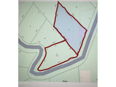 This 3-bedroom, 2-bath beauty sits on two very private lots on Bent Creek Golf Course in Tennessee - for sale on GolfHomes.com, golf home, golf lot