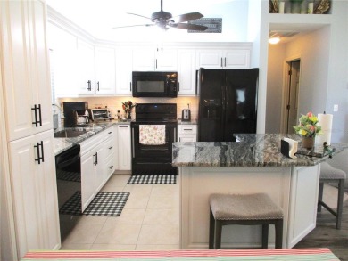 BEAUTIFUL UPDATED STUCCO OPEN CHESTNUT CHECKS OFF A LOT  OF MUST on Preserve Golf Club in Florida - for sale on GolfHomes.com, golf home, golf lot