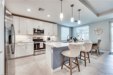 Discover this stunning first-floor coach home in the gated on Verandah Golf Course and Club in Florida - for sale on GolfHomes.com, golf home, golf lot