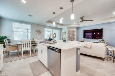 Discover this stunning first-floor coach home in the gated on Verandah Golf Course and Club in Florida - for sale on GolfHomes.com, golf home, golf lot