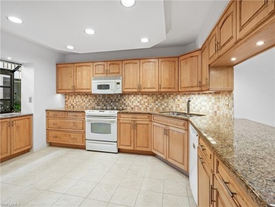 DESIRABLE LOCATION! Lugano, located in the heart of Pelican Bay on Club at Pelican Bay Golf Course in Florida - for sale on GolfHomes.com, golf home, golf lot