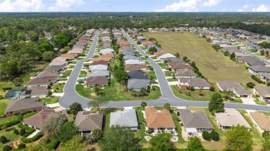 Great house-great location-great price.  Not too big, not too on Eagle Ridge At Spruce Creek Country Club in Florida - for sale on GolfHomes.com, golf home, golf lot