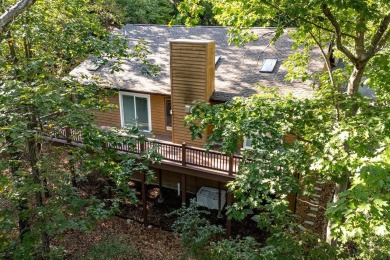 Perched high on the mountain in Massanutten's four-season resort on Woodstone Meadows Golf Course At Massanutten in Virginia - for sale on GolfHomes.com, golf home, golf lot