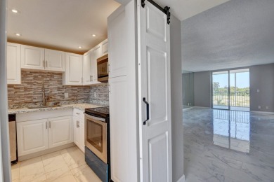 East Boca. 30-year inspection just passed. Totally updated on Ocean Breeze Golf and Country Club in Florida - for sale on GolfHomes.com, golf home, golf lot