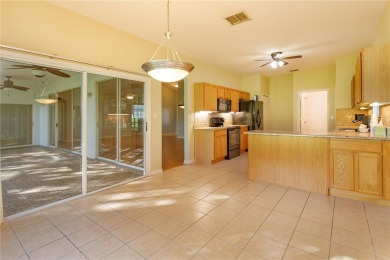 Welcome to this beautifully maintained 3-bedroom, 2-bath home on Plantation Golf Club in Florida - for sale on GolfHomes.com, golf home, golf lot