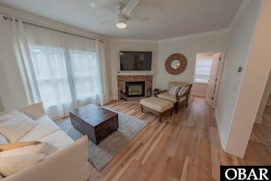 Welcome to your dream home, perfectly positioned in the heart of on Duck Woods Country Club in North Carolina - for sale on GolfHomes.com, golf home, golf lot