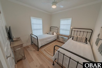 Welcome to your dream home, perfectly positioned in the heart of on Duck Woods Country Club in North Carolina - for sale on GolfHomes.com, golf home, golf lot