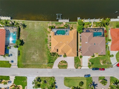 PUNTA GORDA ISLES!! SPACIOUS 3 BEDROOM, 2.5 BATH, WATERFRONT W/ on Saint Andrews South Golf Club in Florida - for sale on GolfHomes.com, golf home, golf lot