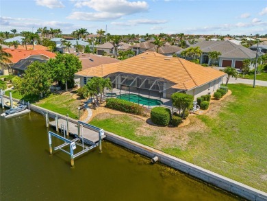 PUNTA GORDA ISLES!! SPACIOUS 3 BEDROOM, 2.5 BATH, WATERFRONT W/ on Saint Andrews South Golf Club in Florida - for sale on GolfHomes.com, golf home, golf lot