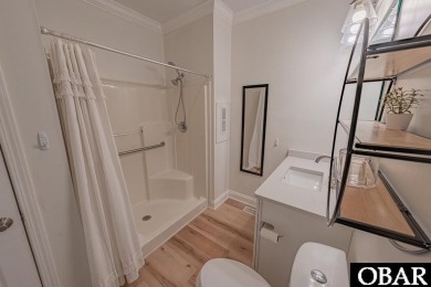 Welcome to your dream home, perfectly positioned in the heart of on Duck Woods Country Club in North Carolina - for sale on GolfHomes.com, golf home, golf lot