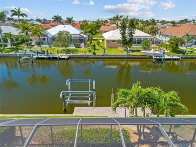 PUNTA GORDA ISLES!! SPACIOUS 3 BEDROOM, 2.5 BATH, WATERFRONT W/ on Saint Andrews South Golf Club in Florida - for sale on GolfHomes.com, golf home, golf lot