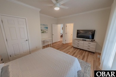 Welcome to your dream home, perfectly positioned in the heart of on Duck Woods Country Club in North Carolina - for sale on GolfHomes.com, golf home, golf lot