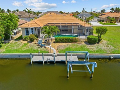 PUNTA GORDA ISLES!! SPACIOUS 3 BEDROOM, 2.5 BATH, WATERFRONT W/ on Saint Andrews South Golf Club in Florida - for sale on GolfHomes.com, golf home, golf lot