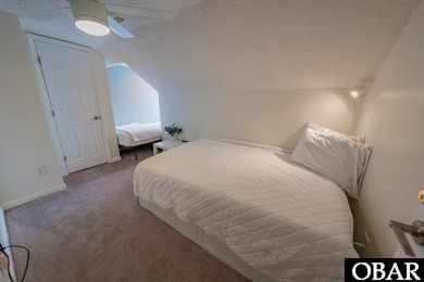 Welcome to your dream home, perfectly positioned in the heart of on Duck Woods Country Club in North Carolina - for sale on GolfHomes.com, golf home, golf lot