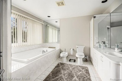 Gorgeous Spacious Contemporary 5 Bedroom Home Situated in a on Knollwood Country Club in Michigan - for sale on GolfHomes.com, golf home, golf lot