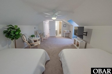 Welcome to your dream home, perfectly positioned in the heart of on Duck Woods Country Club in North Carolina - for sale on GolfHomes.com, golf home, golf lot