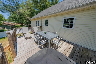 Welcome to your dream home, perfectly positioned in the heart of on Duck Woods Country Club in North Carolina - for sale on GolfHomes.com, golf home, golf lot