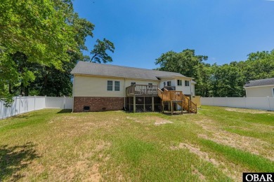 Welcome to your dream home, perfectly positioned in the heart of on Duck Woods Country Club in North Carolina - for sale on GolfHomes.com, golf home, golf lot