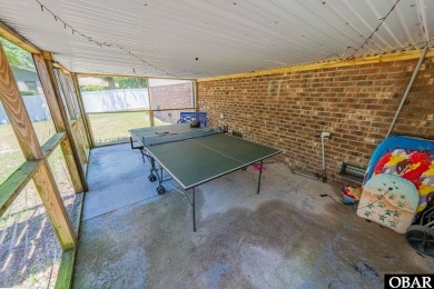 Welcome to your dream home, perfectly positioned in the heart of on Duck Woods Country Club in North Carolina - for sale on GolfHomes.com, golf home, golf lot