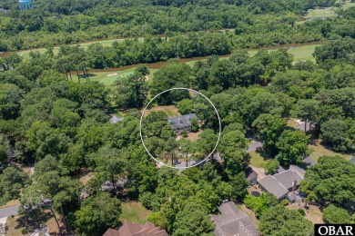 Welcome to your dream home, perfectly positioned in the heart of on Duck Woods Country Club in North Carolina - for sale on GolfHomes.com, golf home, golf lot