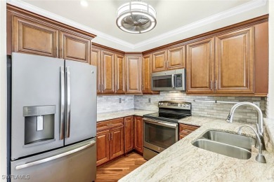 Welcome to this stunning second-floor coach home condo nestled on Spanish Wells Golf and Country Club in Florida - for sale on GolfHomes.com, golf home, golf lot