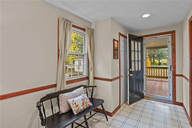 Nestled in the desirable Warwick Neck community, this inviting on Warwick Country Club in Rhode Island - for sale on GolfHomes.com, golf home, golf lot