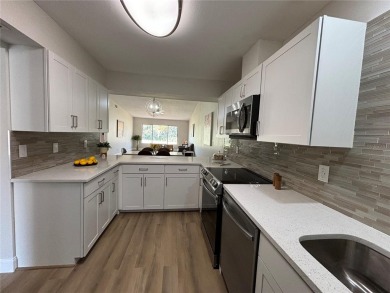 Beautiful, completely renovated 2 BR/ 2 BA condo in the on Tarpon Woods Golf Club in Florida - for sale on GolfHomes.com, golf home, golf lot