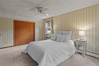 Nestled in the desirable Warwick Neck community, this inviting on Warwick Country Club in Rhode Island - for sale on GolfHomes.com, golf home, golf lot