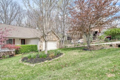 Nestled in the heart of Fairfield Glade North, this 2006-built on Heatherhurst Golf Course in Tennessee - for sale on GolfHomes.com, golf home, golf lot