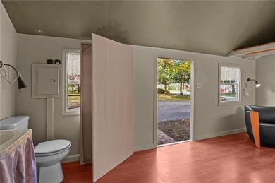 Nestled in the desirable Warwick Neck community, this inviting on Warwick Country Club in Rhode Island - for sale on GolfHomes.com, golf home, golf lot