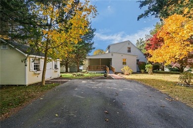 Nestled in the desirable Warwick Neck community, this inviting on Warwick Country Club in Rhode Island - for sale on GolfHomes.com, golf home, golf lot