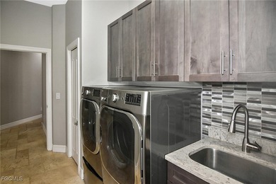 This beautiful Manchester Grand is officially on the market-and on Heritage Palms Golf and Country Club in Florida - for sale on GolfHomes.com, golf home, golf lot