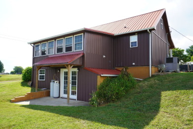 Discover the elegance of Dumplin Valley on Patriot Hills Golf Club in Tennessee - for sale on GolfHomes.com, golf home, golf lot