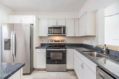Welcome to this beautifully updated 2-bedroom, 2-bath condo in on Cove Cay Country Club in Florida - for sale on GolfHomes.com, golf home, golf lot