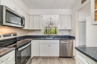 Welcome to this beautifully updated 2-bedroom, 2-bath condo in on Cove Cay Country Club in Florida - for sale on GolfHomes.com, golf home, golf lot