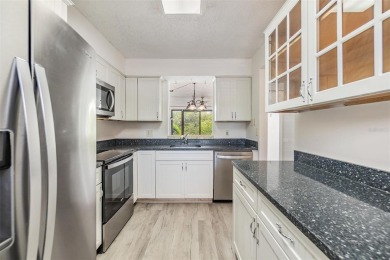 Welcome to this beautifully updated 2-bedroom, 2-bath condo in on Cove Cay Country Club in Florida - for sale on GolfHomes.com, golf home, golf lot