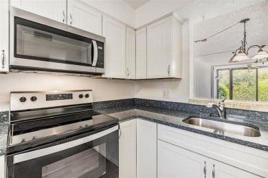 Welcome to this beautifully updated 2-bedroom, 2-bath condo in on Cove Cay Country Club in Florida - for sale on GolfHomes.com, golf home, golf lot