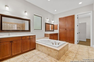 Luxury living awaits in The Dominion! This elegant corner-lot 3 on The Dominion Country Club in Texas - for sale on GolfHomes.com, golf home, golf lot