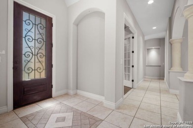 Luxury living awaits in The Dominion! This elegant corner-lot 3 on The Dominion Country Club in Texas - for sale on GolfHomes.com, golf home, golf lot