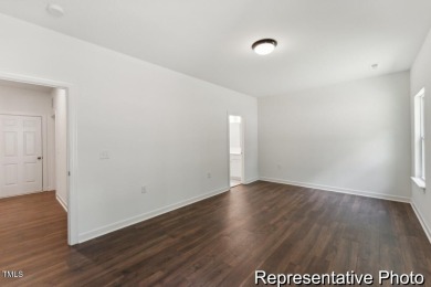 This semi-custom home in Lake Royale offers 3BR/2.5BA and 2,098 on River Golf and County Club at Lake Royale in North Carolina - for sale on GolfHomes.com, golf home, golf lot