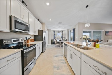 BETTER THAN NEW, BUILT IN 2024- SPECTACULAR SUNSETS over the on Heritage Landing Golf  in Florida - for sale on GolfHomes.com, golf home, golf lot