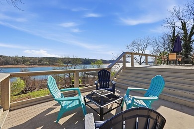 Furnished lakefront home with stunning views and a gentle walk on  in Arkansas - for sale on GolfHomes.com, golf home, golf lot