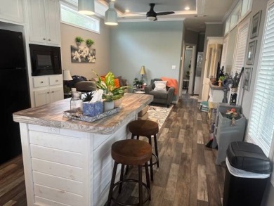 MOVE-IN READY | 2022 Build | No Rear Neighbors!  Fully furnished on Sandpiper Golf Club in Florida - for sale on GolfHomes.com, golf home, golf lot