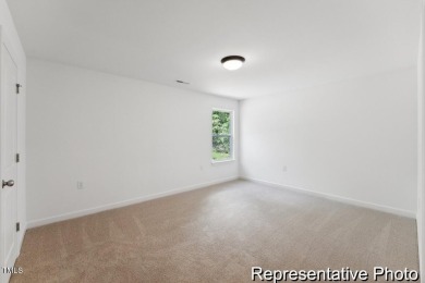 This semi-custom home in Lake Royale offers 3BR/2.5BA and 2,098 on River Golf and County Club at Lake Royale in North Carolina - for sale on GolfHomes.com, golf home, golf lot