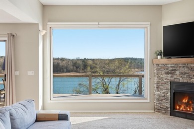 Furnished lakefront home with stunning views and a gentle walk on  in Arkansas - for sale on GolfHomes.com, golf home, golf lot