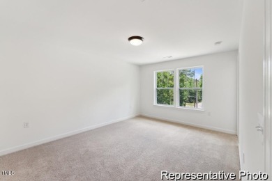 This semi-custom home in Lake Royale offers 3BR/2.5BA and 2,098 on River Golf and County Club at Lake Royale in North Carolina - for sale on GolfHomes.com, golf home, golf lot