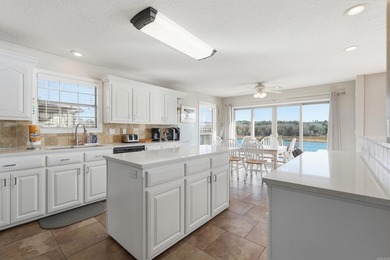 Furnished lakefront home with stunning views and a gentle walk on  in Arkansas - for sale on GolfHomes.com, golf home, golf lot