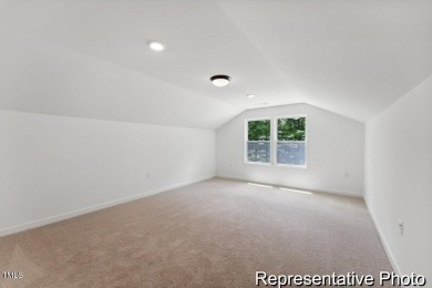 This semi-custom home in Lake Royale offers 3BR/2.5BA and 2,098 on River Golf and County Club at Lake Royale in North Carolina - for sale on GolfHomes.com, golf home, golf lot